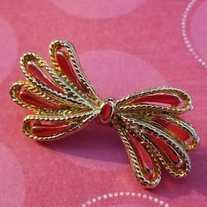 Vintage bow pin red enamel gold tone brooch